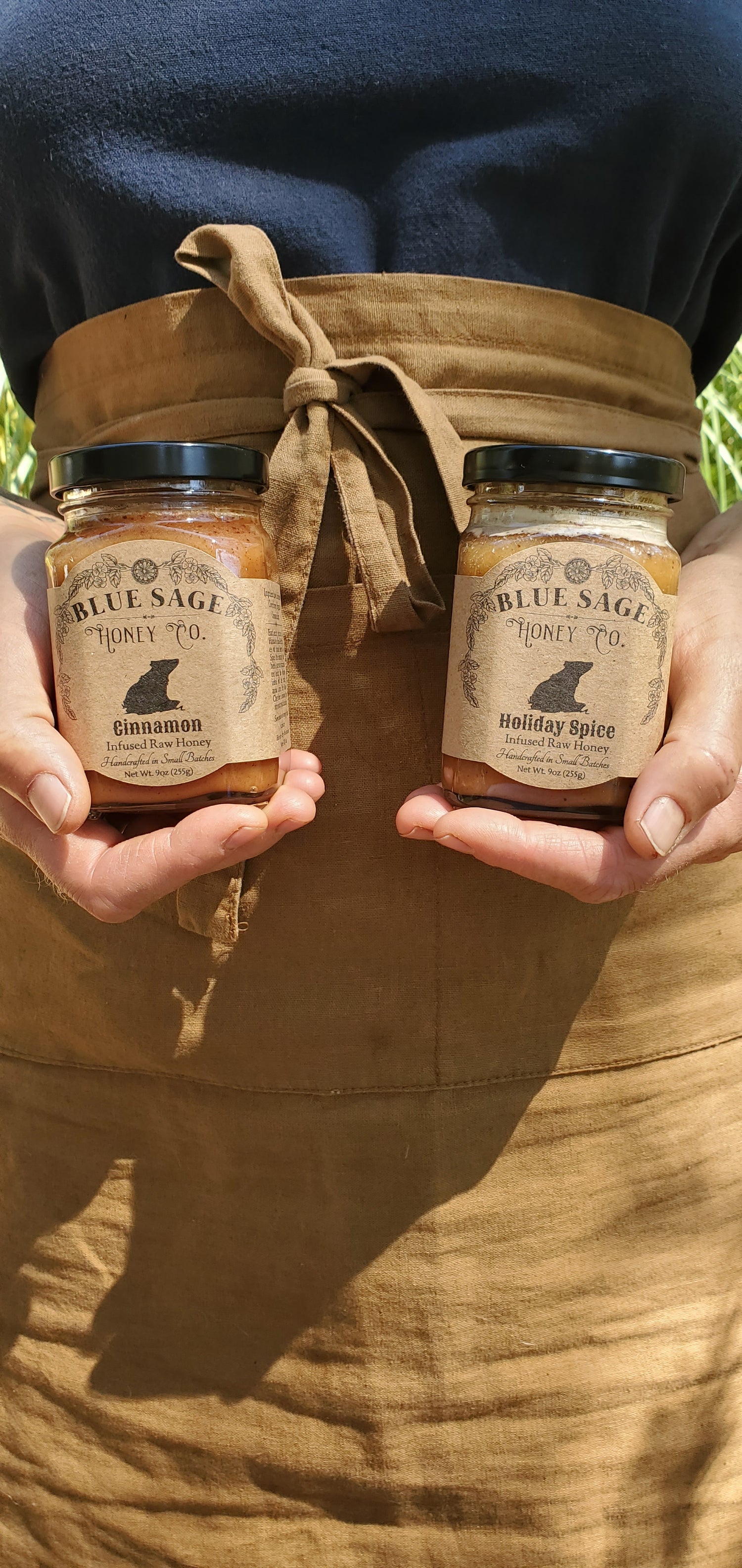 Holding Cinnamon and Holiday Spice Infused Honey