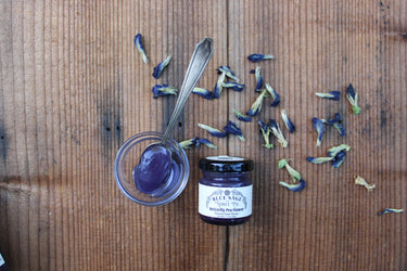 Blue Sage Honey Co raw honey with butterfly pea flower in cobalt blue