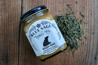 Blue Sage Ginger Root infused raw honey jar with bear label and loose tea leaves
