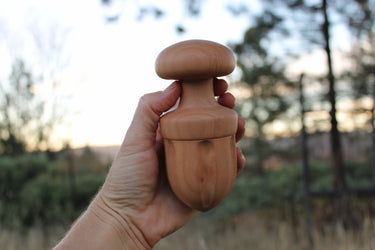 Full profile of artisan madrone wood cocktail juicer