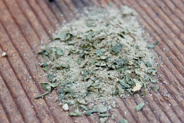 Blue Sage Family Farm herb and spice blend for soup broth on wood