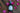 Bottle of Blue Sage Honey Co. Rose Water with pink rose petals on a wooden surface