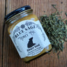 Blue Sage Ginger Root infused raw honey jar with bear label and loose tea leaves