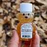 Blue Sage Raw Clover Honey in 2oz bear-shaped bottle with black hat and label